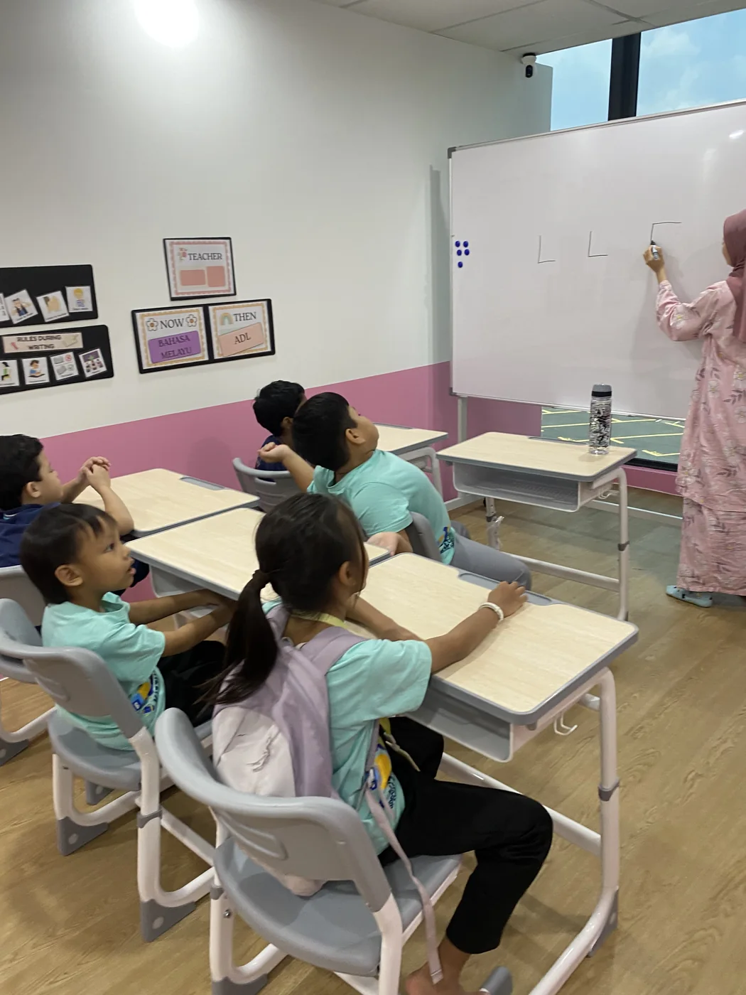 A learner taking part in a guided classroom task